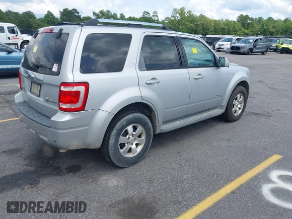 2009 Ford Escape Hybrid z VIN 1FMCU49399KB18857, wystawiony jako IAAI lot #42502324 z przebiegiem 227 828 mil mil oraz . Historia ofert i sprzedaży dostępna na DreamBid. Obrazek 4.