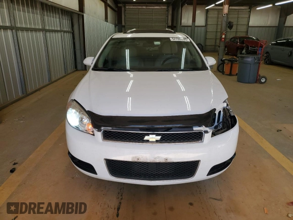 2012 Chevrolet Impala LTZ with VIN 2G1WC5E3XC1102909, listed as a Copart auction lot 52786605 with 185,134 mi miles and Salvage Title. Bid and sale history available at DreamBid. Image 5.