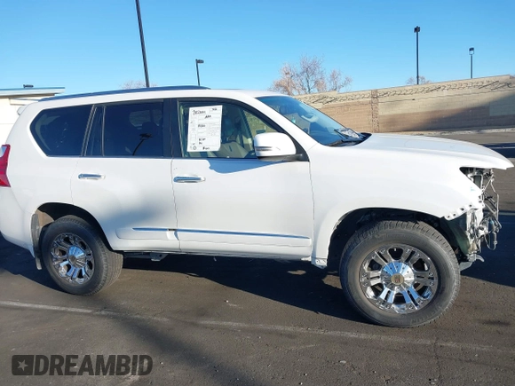 2013 Lexus GX 460 with VIN JTJBM7FX4D5064140, listed as a IAAI auction lot 41626551 with 147,028 mi miles and . Bid and sale history available at DreamBid. Image 14.