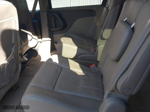 2015 Chrysler Town & Country Touring-L with VIN 2C4RC1CG0FR673981, listed as a IAAI auction lot 41773997 with 107,705 mi miles. Bid and sale history available at carsss.com. Image 8.