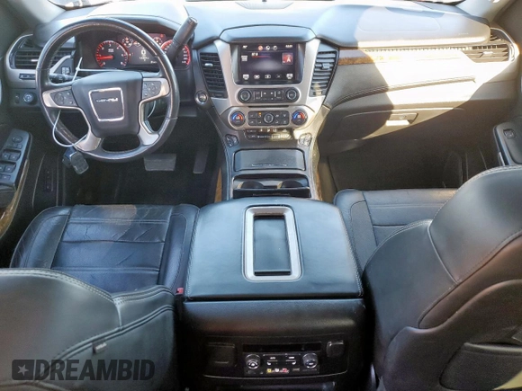 2015 GMC Yukon Denali with VIN 1GKS1CKJ7FR132677, listed as a Copart auction lot 47820925 with 144,821 mi miles and Salvage Title. Bid and sale history available at carsss.com. Image 8.