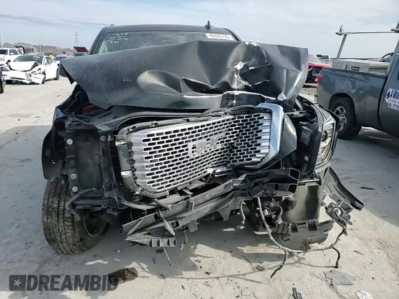 2015 GMC Yukon Denali with VIN 1GKS1CKJ2FR699959, listed as a Copart auction lot 42035195 with 0 mi miles and Salvage Title. Bid and sale history available at carsss.com. Image 12.