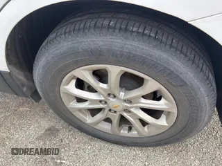2020 Chevrolet Equinox LT z VIN 2GNAXJEV0L6158433, wystawiony jako IAAI lot #42556113 z przebiegiem 82 277 mil mil oraz . Historia ofert i sprzedaży dostępna na DreamBid. Obrazek 6.