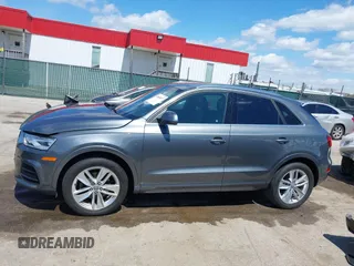 2017 Audi Q3 Premium Plus z VIN WA1JCCFS5HR003127, wystawiony jako IAAI lot #42060877 z przebiegiem 78 881 mil mil oraz . Historia ofert i sprzedaży dostępna na DreamBid. Obrazek 14.