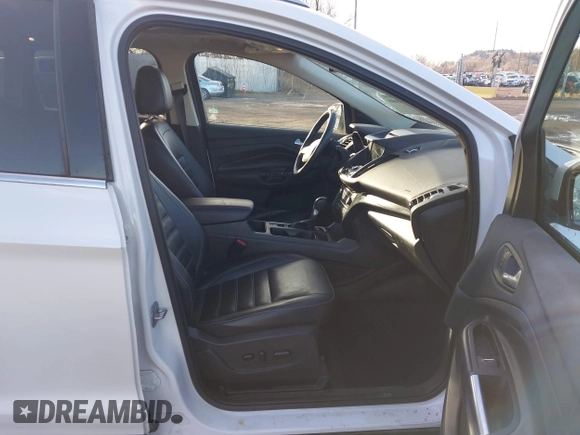 2017 Ford Escape Titanium with VIN 1FMCU9J98HUA04994, listed as a IAAI auction lot 41139988 with 136,989 mi miles. Bid and sale history available at carsss.com. Image 5.