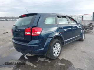 2013 Dodge Journey SE z VIN 3C4PDCAB7DT701180, wystawiony jako IAAI lot #41609700 z przebiegiem 118 207 mil mil oraz . Historia ofert i sprzedaży dostępna na DreamBid. Obrazek 4.