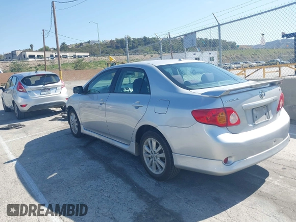2010 Toyota Corolla with VIN 1NXBU4EE7AZ350286, listed as a IAAI auction lot 41955852 with 196,721 mi miles. Bid and sale history available at carsss.com. Image 3.
