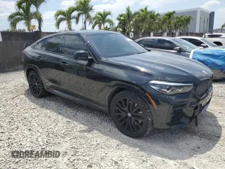 2023 BMW X6 M50i z VIN 5UXCY8C02P9P48141, wystawiony jako Copart lot #52531895 z przebiegiem 33 764 mil mil oraz Szkody całkowita. Historia ofert i sprzedaży dostępna na DreamBid. Obrazek 4.