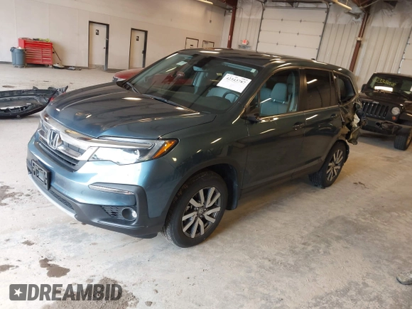 2021 Honda Pilot EX-L z VIN 5FNYF6H54MB082455, wystawiony jako IAAI lot #42343787 z przebiegiem 25 954 mil mil oraz . Historia ofert i sprzedaży dostępna na DreamBid. Obrazek 2.