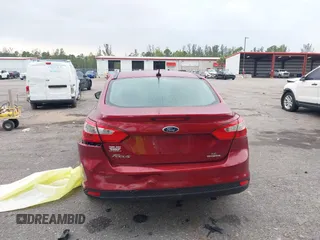2013 Ford Focus SE with VIN 1FADP3F23DL380386, listed as a IAAI auction lot 41869774 with 112,932 mi miles and . Bid and sale history available at carsss.com. Image 6.