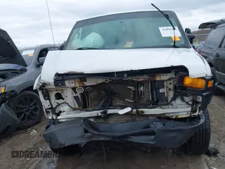 2013 Ford Econoline Cargo Commercial with VIN 1FTNE1EW6DDB31491, listed as a IAAI auction lot 41860383 with 278,572 mi miles. Bid and sale history available at carsss.com. Image 13.