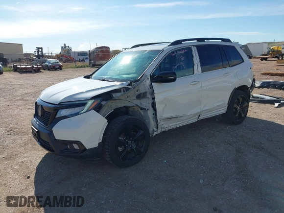 2019 Honda Passport Elite z VIN 5FNYF8H0XKB001472, wystawiony jako IAAI lot #42143890 z przebiegiem 98 119 mil mil oraz . Historia ofert i sprzedaży dostępna na DreamBid. Obrazek 20.