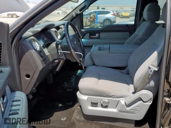 2012 Ford F-150 XL with VIN 1FTFW1EF2CFC06627, listed as a Copart auction lot 58187725 with 185,553 mi miles and Salvage title. Bid and sale history available at DreamBid. Image 7.