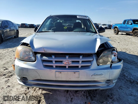 2003 Hyundai Accent with VIN KMHCF35C73U273610, listed as a Copart auction lot 85868294 with 168,203 mi miles and Salvage Title. Bid and sale history available at carsss.com. Image 5.