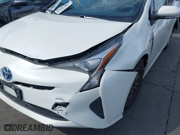 2016 Toyota Prius Two with VIN JTDKBRFU3G3516895, listed as a IAAI auction lot 41720956 with 234,879 mi miles and . Bid and sale history available at DreamBid. Image 18.