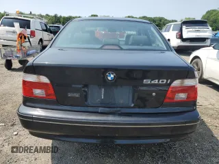 2003 BMW 5 Series 540i z VIN WBADN63413GN89699, wystawiony jako Copart lot #60373545 z przebiegiem 243 882 mil mil oraz Czysty tytuł • Clean title. Historia ofert i sprzedaży dostępna na DreamBid. Obrazek 6.