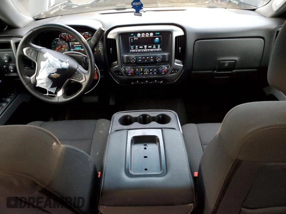 2017 Chevrolet Silverado 1500 LT with VIN 1GCVKREC1HZ225218, listed as a Copart auction lot 48948735 with 114,627 mi miles and Salvage Title. Bid and sale history available at DreamBid. Image 8.