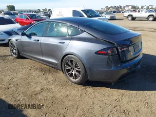 2023 Tesla Model S with VIN 5YJSA1E5XPF500341, listed as a IAAI auction lot 40756406 with 11,583 mi miles and . Bid and sale history available at DreamBid. Image 3.