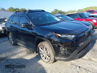 2024 Toyota RAV4 XLE Premium with VIN 2T3C1RFV1RW328165, listed as a IAAI auction lot 42021205 with 14,888 mi miles and . Bid and sale history available at DreamBid. Image 1.