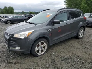 2016 Ford Escape SE z VIN 1FMCU0GX9GUC69200, wystawiony jako Copart lot #57565265 z przebiegiem 131 353 mil mil oraz Czysty tytuł • Clean title. Historia ofert i sprzedaży dostępna na DreamBid. Obrazek 1.