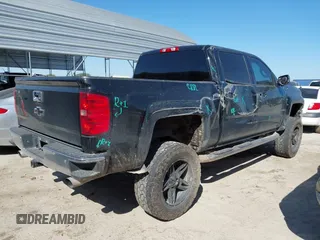 2014 Chevrolet Silverado 1500 LTZ with VIN 3GCUKSEC9EG325632, listed as a IAAI auction lot 41952756 with 196,779 mi miles and . Bid and sale history available at DreamBid. Image 4.