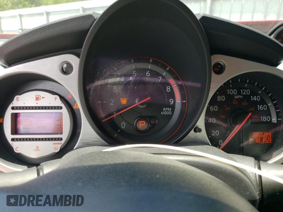 2010 Nissan 370Z Touring with VIN JN1AZ4EH4AM505004, listed as a Copart auction lot 57652374 with 86,689 mi miles and Salvage Title. Bid and sale history available at carsss.com. Image 9.