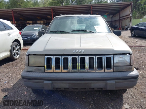 1994 Jeep Grand Cherokee Laredo with VIN 1J4GZ58Y0RC200247, listed as a IAAI auction lot 41781078 with 217,698 mi miles. Bid and sale history available at carsss.com. Image 6.