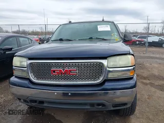 2004 GMC Yukon SLT with VIN 1GKEK13Z74R114583, listed as a IAAI auction lot 41834400 with 311,567 mi miles. Bid and sale history available at carsss.com. Image 12.