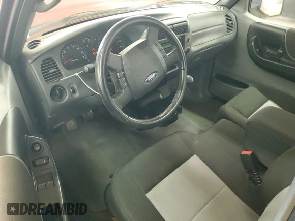 2009 Ford Ranger XL with VIN 1FTYR10D39PA15761, listed as a Copart auction lot 61823265 with 148,225 mi miles and Salvage title. Bid and sale history available at DreamBid. Image 8.