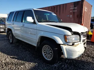 2002 Isuzu Trooper S с VIN JACDJ58X327J00096, выставлен на аукционе Copart как лот 80221584 с пробегом 244 137 миль миль и Списание • Salvage title. История ставок и продаж доступна на DreamBid. Изображение 4.