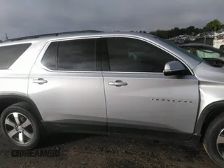 2021 Chevrolet Traverse LT with VIN 1GNERHKW6MJ157311, listed as a IAAI auction lot 42256458 with 97,635 mi miles and . Bid and sale history available at DreamBid. Image 13.