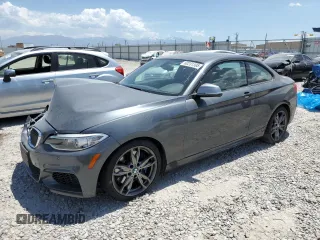 2015 BMW 2 Series M235i with VIN WBA1J7C55FV253647, listed as a Copart auction lot 60231395 with 57,639 mi miles and Salvage title. Bid and sale history available at DreamBid. Image 1.