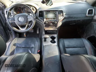 2014 Jeep Grand Cherokee Overland with VIN 1C4RJFCG2EC281062, listed as a Copart auction lot 47099225 with 127,660 mi miles and Salvage Title. Bid and sale history available at carsss.com. Image 8.