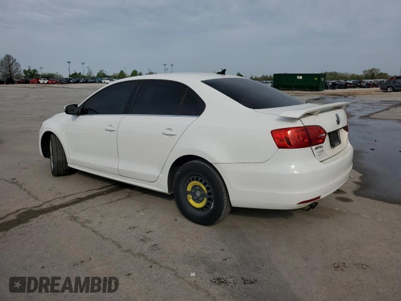 2013 Volkswagen Jetta TDI w/Premium/Nav with VIN 3VWLL7AJ4DM242682, listed as a Copart auction lot 53879635 with 123,945 mi miles and Salvage title. Bid and sale history available at DreamBid. Image 2.