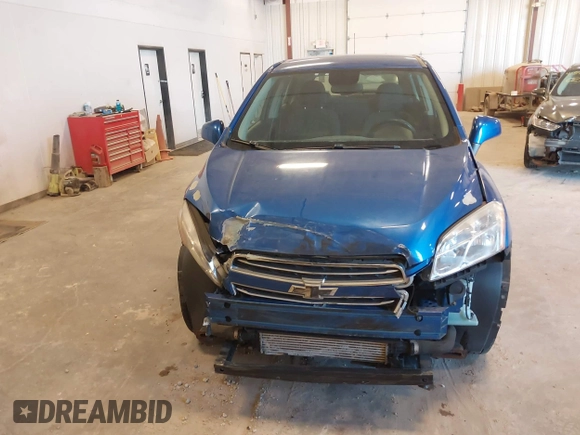 2015 Chevrolet Trax LS with VIN KL7CJPSB5FB186081, listed as a IAAI auction lot 41888072 with 140,087 mi miles. Bid and sale history available at carsss.com. Image 6.