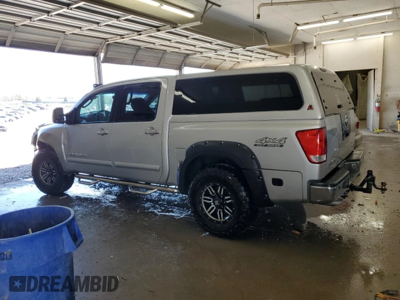 2005 Nissan Titan LE with VIN 1N6AA07B25N505392, listed as a Copart auction lot 50221945 with 187,780 mi miles and Salvage Title. Bid and sale history available at carsss.com. Image 2.