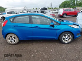 2015 Ford Fiesta SE z VIN 3FADP4EJ9FM133020, wystawiony jako IAAI lot #42302738 z przebiegiem 115 669 mil mil oraz . Historia ofert i sprzedaży dostępna na DreamBid. Obrazek 13.