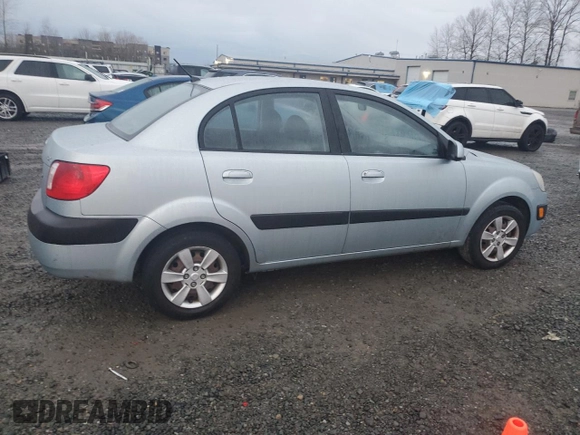 2007 Kia Rio LX with VIN KNADE123476256372, listed as a Copart auction lot 84759904 with 88,725 mi miles and Salvage Title. Bid and sale history available at carsss.com. Image 3.