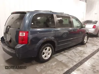 2008 Dodge Grand Caravan SE z VIN 1D8HN44H88B126071, wystawiony jako IAAI lot #41537148 z przebiegiem 231 840 mil mil oraz . Historia ofert i sprzedaży dostępna na DreamBid. Obrazek 4.