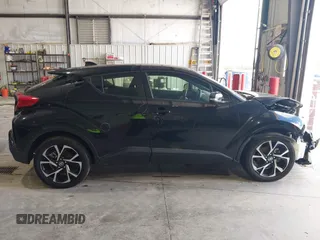 2020 Toyota C-HR LE with VIN JTNKHMBX1L1077957, listed as a IAAI auction lot 42159765 with 83,138 mi miles and . Bid and sale history available at DreamBid. Image 14.