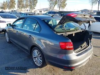 2015 Volkswagen Jetta Sport with VIN 3VWD17AJ2FM318669, listed as a IAAI auction lot 41266868 with 124,539 mi miles and . Bid and sale history available at DreamBid. Image 3.