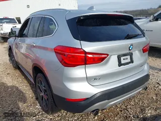 2019 BMW X1 sDrive28i with VIN WBXHU7C52K3H44360, listed as a IAAI auction lot 41709431 with 56,432 mi miles. Bid and sale history available at carsss.com. Image 3.