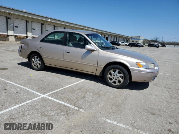 1999 Toyota Camry LE z VIN JT2BF22KXX0230830, wystawiony jako Copart lot #52253985 z przebiegiem 151 758 mil mil oraz Szkoda całkowita • Salvage title. Historia ofert i sprzedaży dostępna na DreamBid. Obrazek 4.