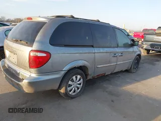 2005 Chrysler Town & Country Touring with VIN 2C4GP54L95R408571, listed as a IAAI auction lot 41792261 with 187,759 mi miles. Bid and sale history available at carsss.com. Image 4.