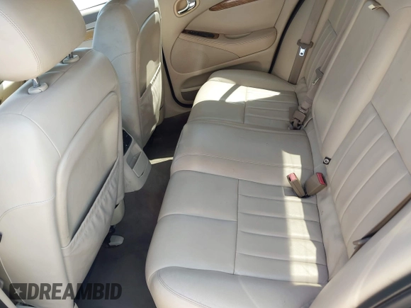 2003 Jaguar S-Type with VIN SAJEA01T13FM70486, listed as a IAAI auction lot 41989501 with 100,109 mi miles and . Bid and sale history available at DreamBid. Image 8.