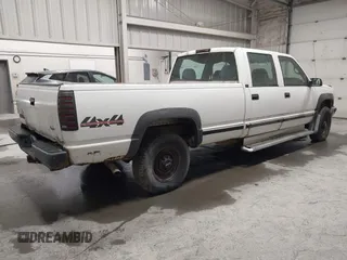 1997 GMC Sierra 3500 z VIN 1GTHK33F4VF004765, wystawiony jako IAAI lot #42053137 z przebiegiem 129 249 mil mil oraz . Historia ofert i sprzedaży dostępna na DreamBid. Obrazek 4.