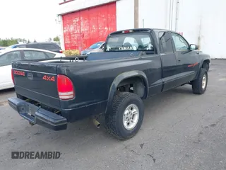 1999 Dodge Dakota SLT with VIN 1B7GG22YXXS229633, listed as a IAAI auction lot 42088939 with 148,049 mi miles and . Bid and sale history available at carsss.com. Image 4.