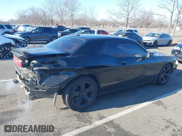 2013 Dodge Challenger R/T with VIN 2C3CDYBT6DH614418, listed as a IAAI auction lot 41583274 with 63,409 mi miles. Bid and sale history available at carsss.com. Image 6.