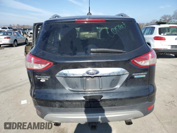 2015 Ford Escape Titanium with VIN 1FMCU0J9XFUB45185, listed as a Copart auction lot 82415114 with 272,818 mi miles and Salvage Title. Bid and sale history available at DreamBid. Image 6.