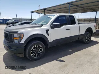 2023 Ford F-150 XL with VIN 1FTEX1CP4PKE31150, listed as a Copart auction lot 68697704 with 8,985 mi miles and Salvage title. Bid and sale history available at DreamBid. Image 1.